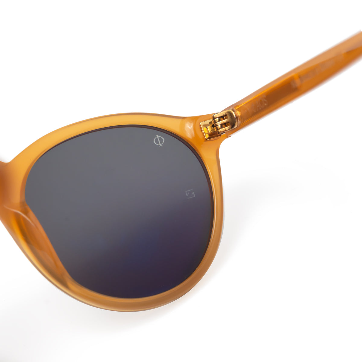 TINOS IN ELECTRUM AMBER WITH ALGAE GREEN LENSES