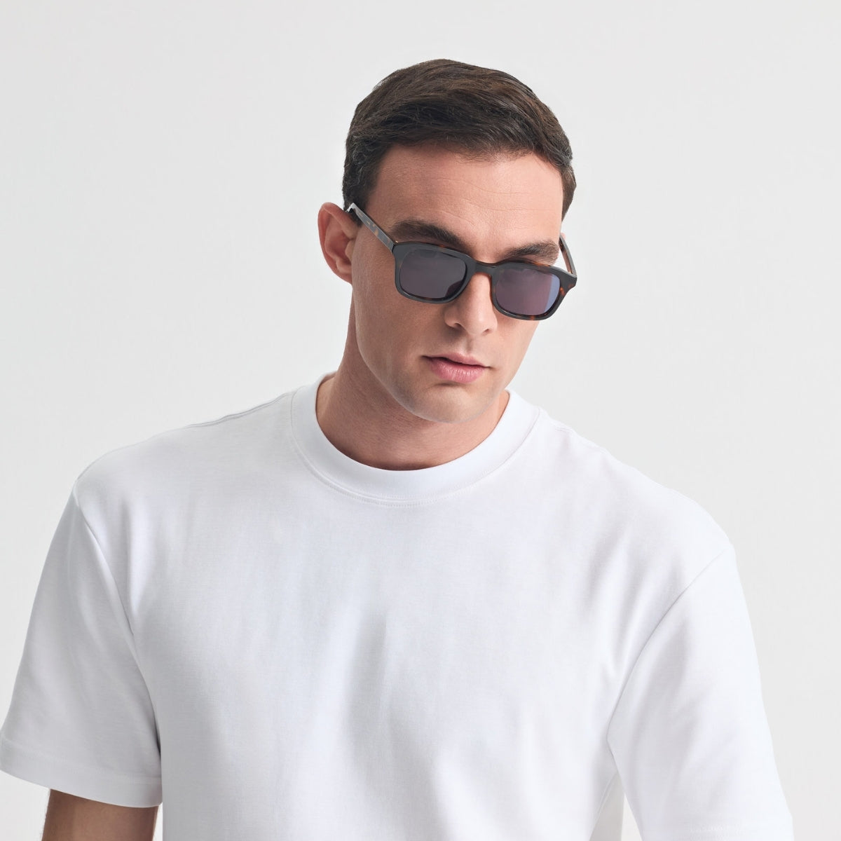 SANTORINI IN MARBLE BROWN WITH AEGEAN BLUE LENSES