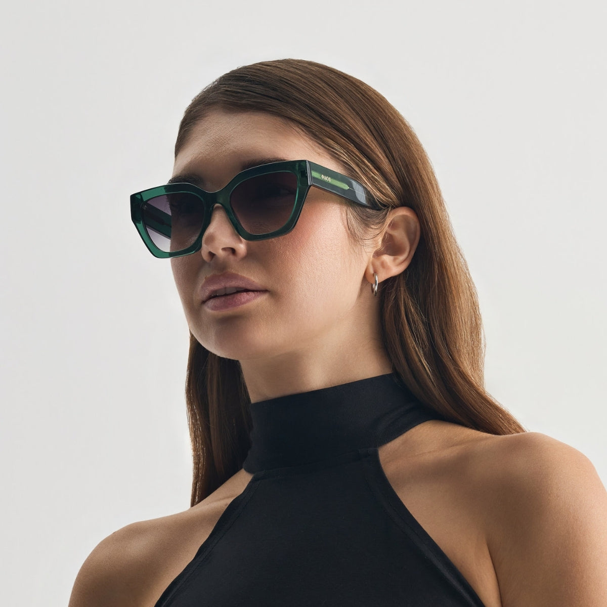 SKYROS IN CRYSTAL GREEN WITH SUNSET GREY LENSES