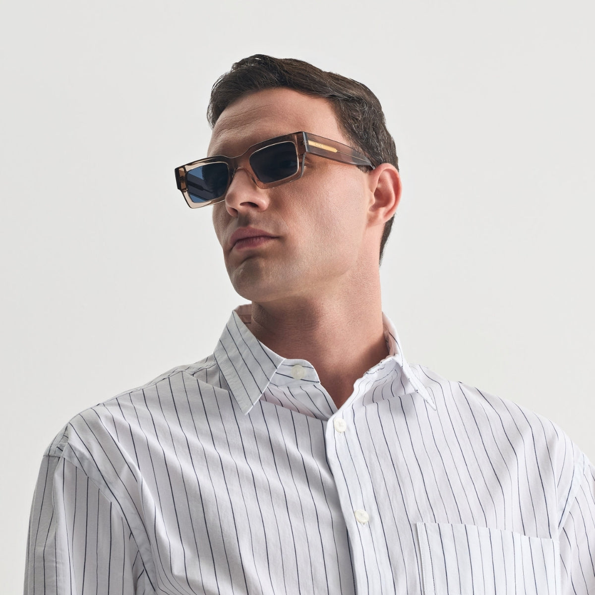 NAXOS IN CRYSTAL BEIGE WITH AEGEAN BLUE LENSES