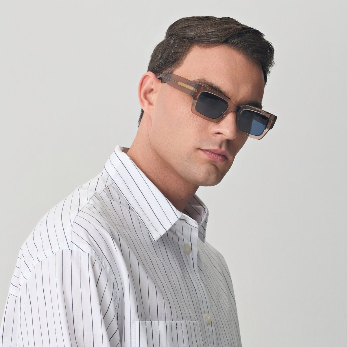 NAXOS IN CRYSTAL BEIGE WITH AEGEAN BLUE LENSES