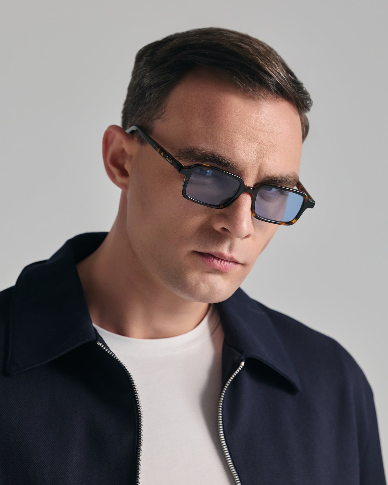 KEROS IN MARBLE BROWN WITH KYANO BLUE LENSES