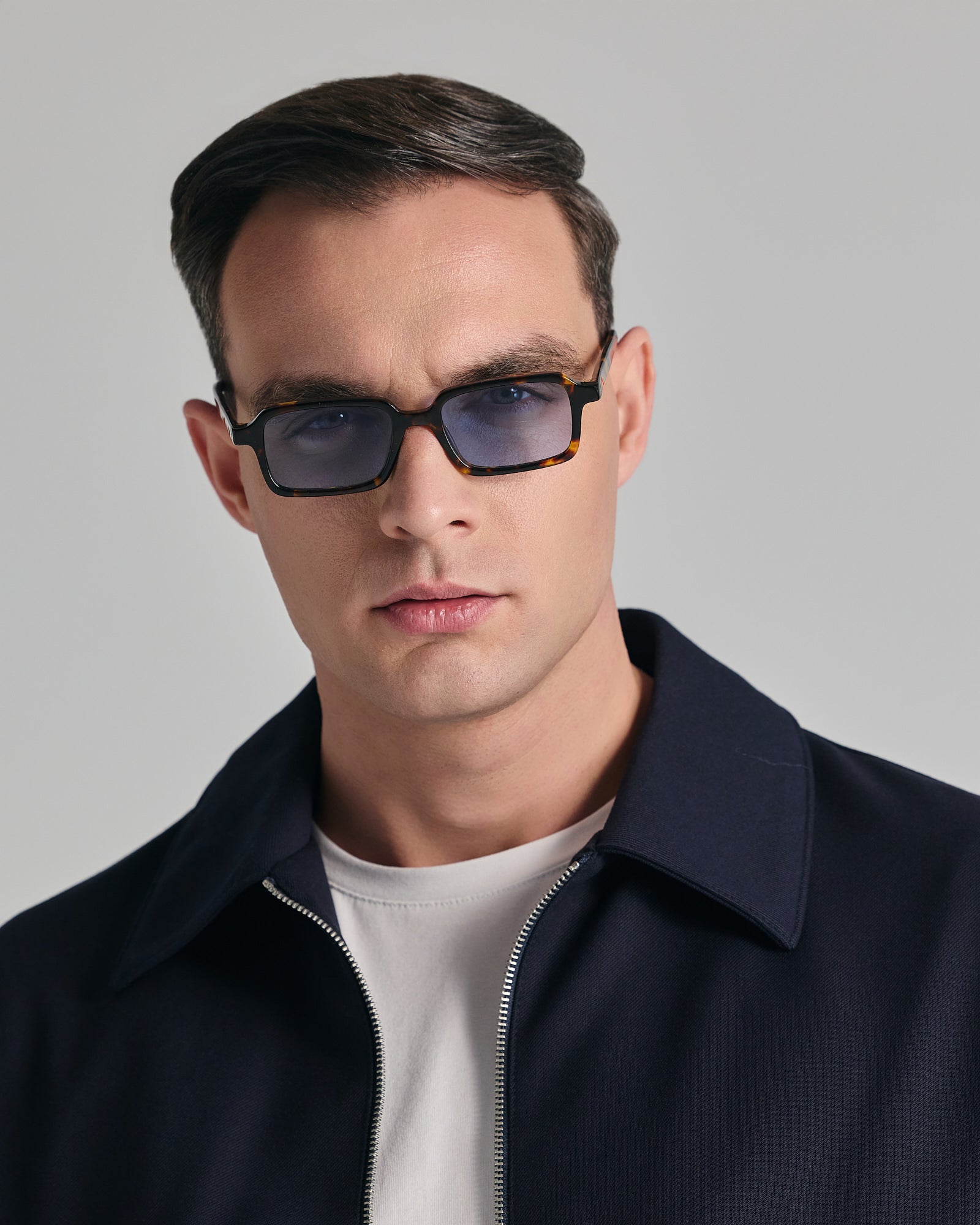 KEROS IN MARBLE BROWN WITH KYANO BLUE LENSES