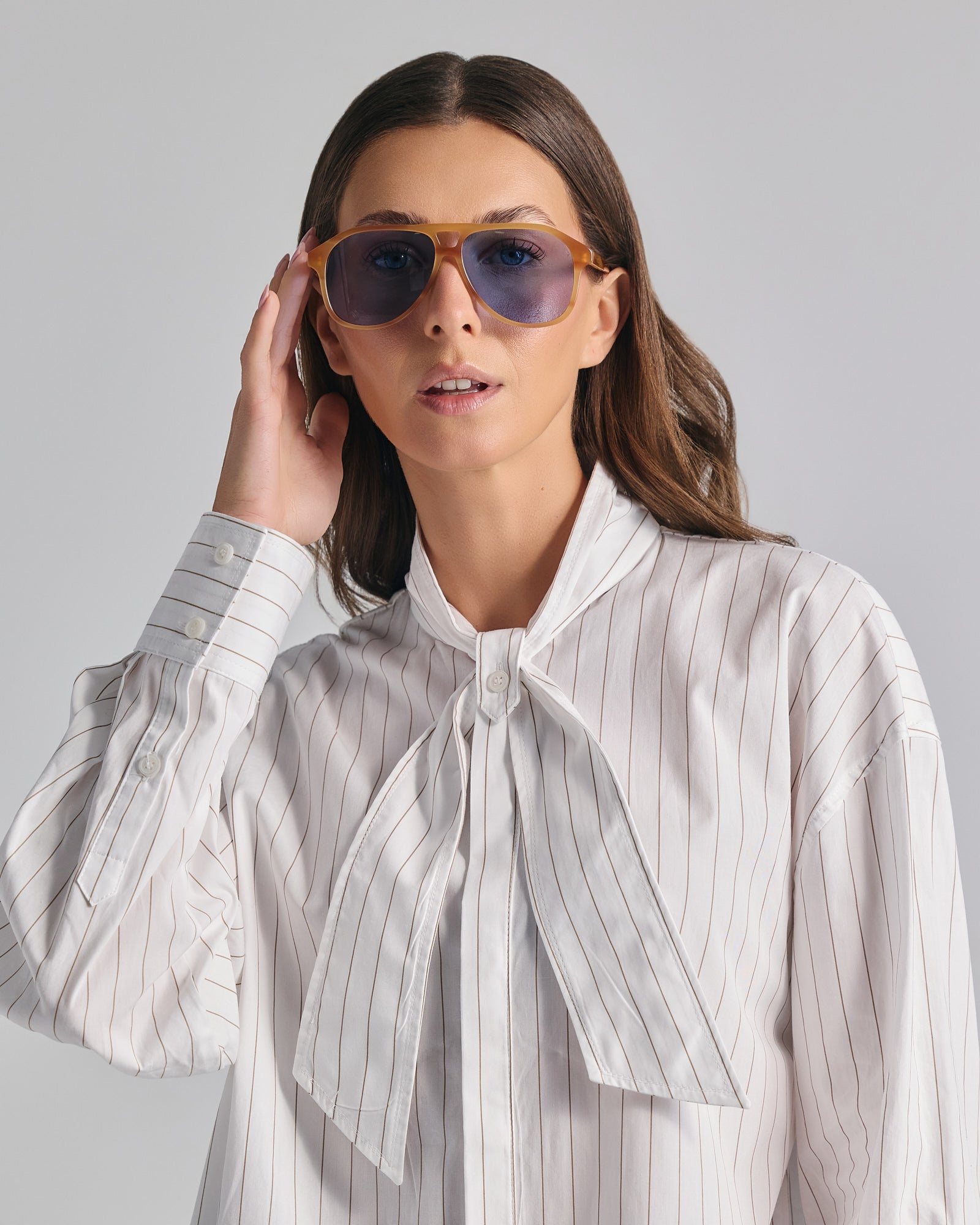 SERIFOS IN MARBLE AMBER WITH KYANO BLUE LENSES