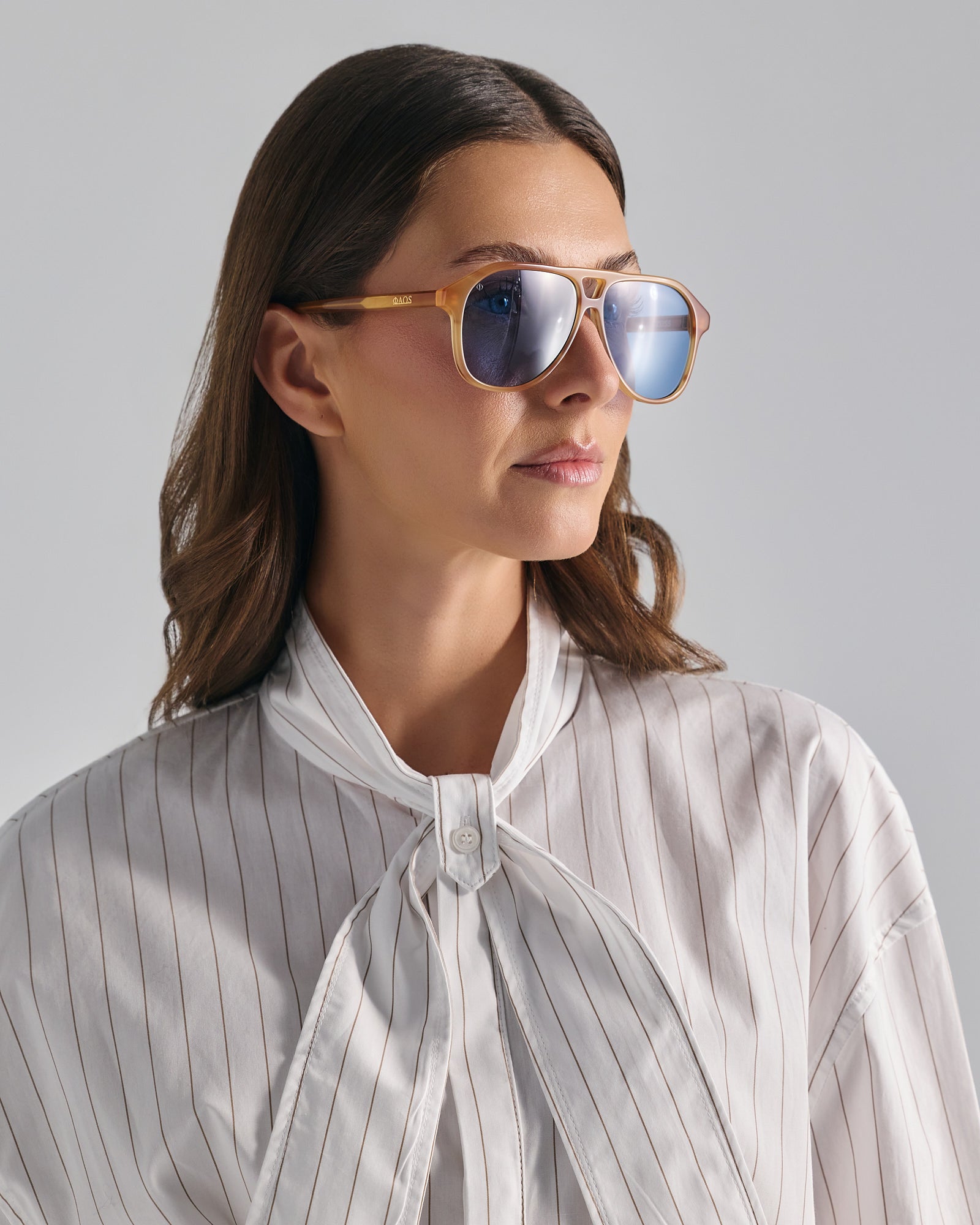 SERIFOS IN MARBLE AMBER WITH KYANO BLUE LENSES