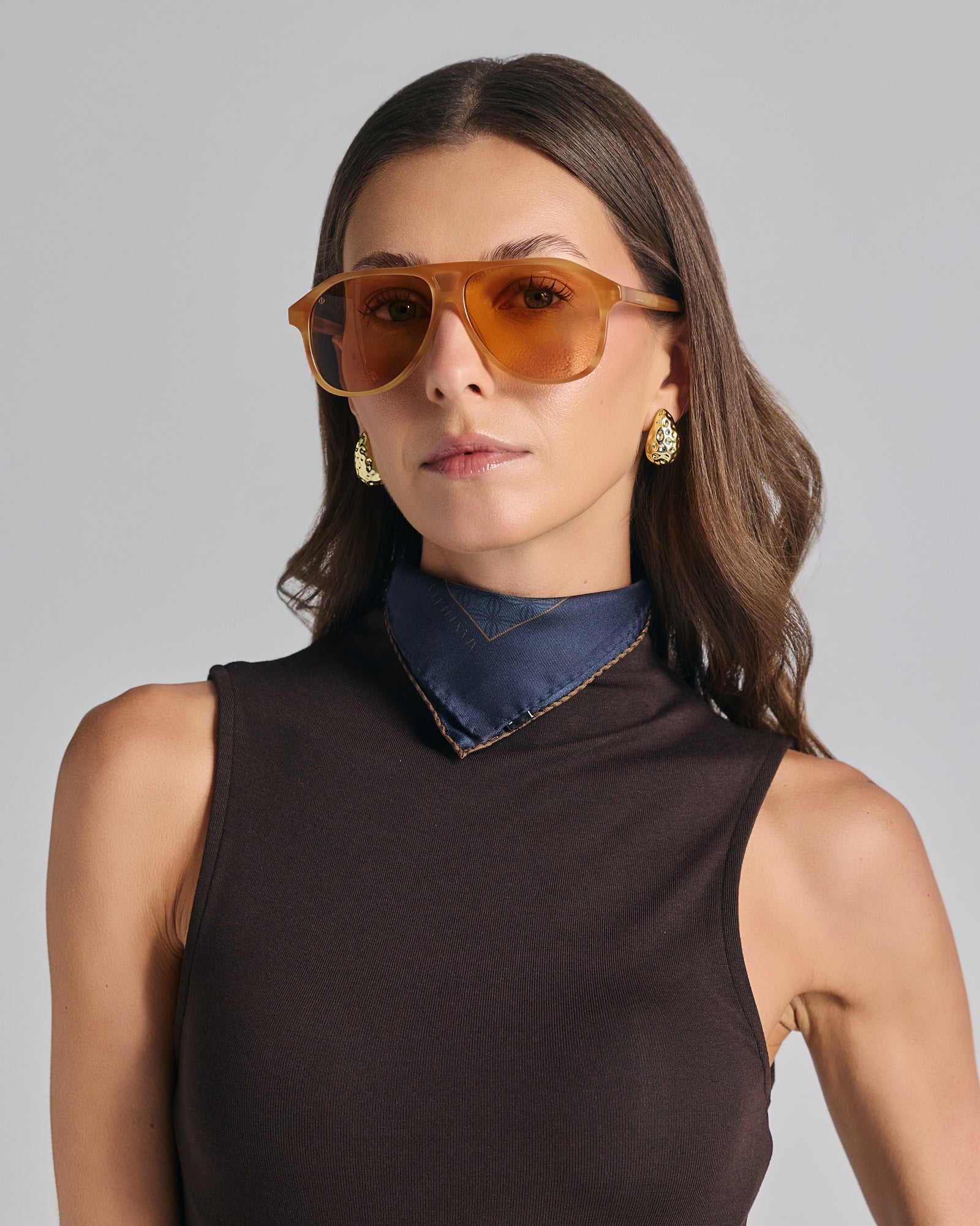 SERIFOS IN MARBLE AMBER WITH POTTERY BROWN LENSES