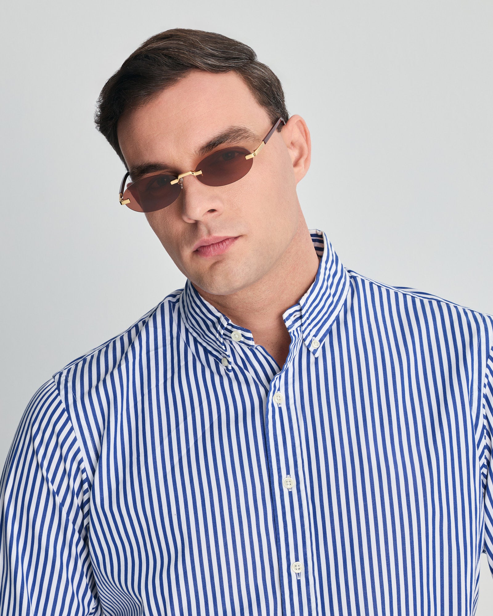 PHAESTUS IN METALIC GOLD WITH MAROON LENSES