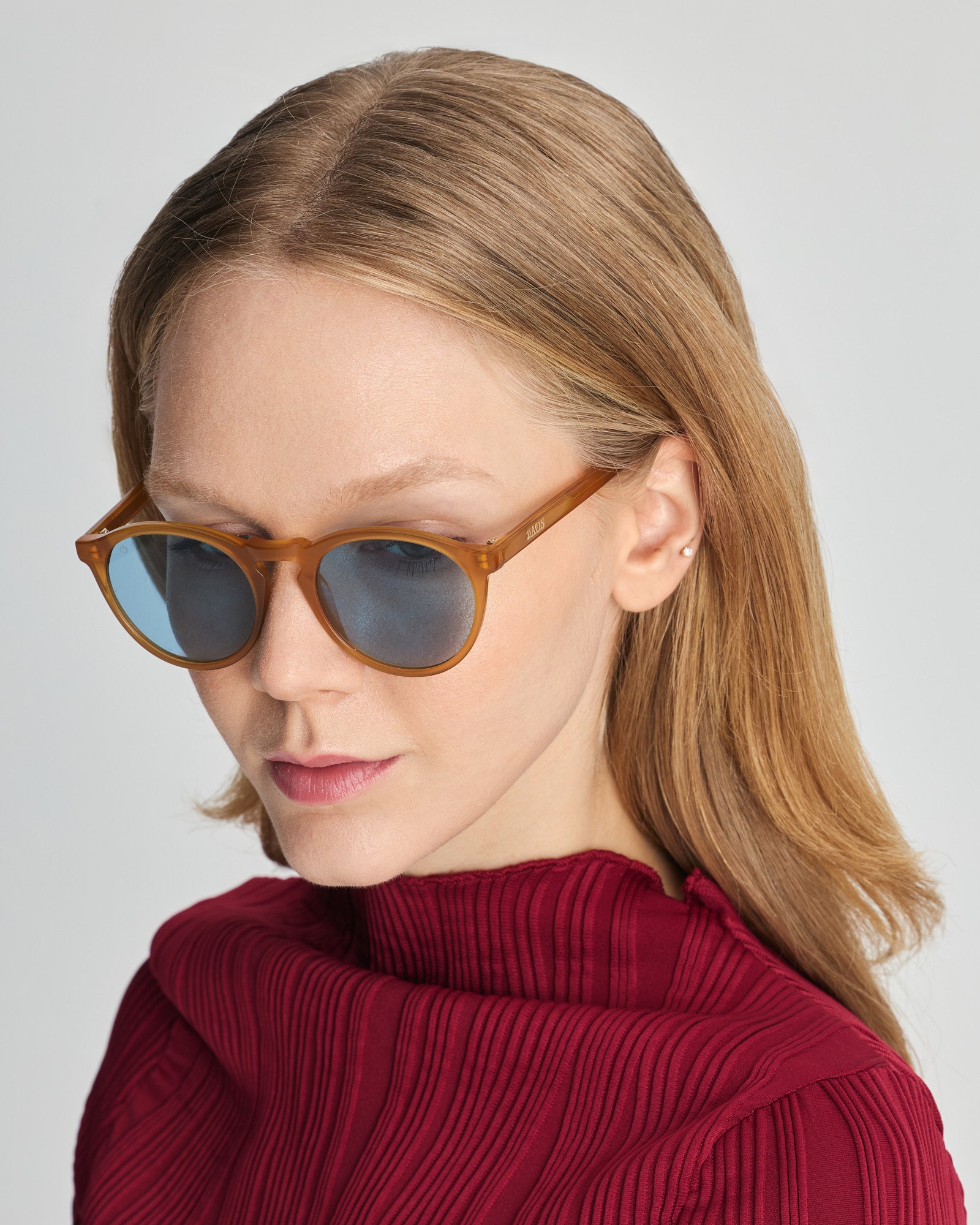 TINOS IN ELECTRUM AMBER WITH KYANO BLUE LENSES