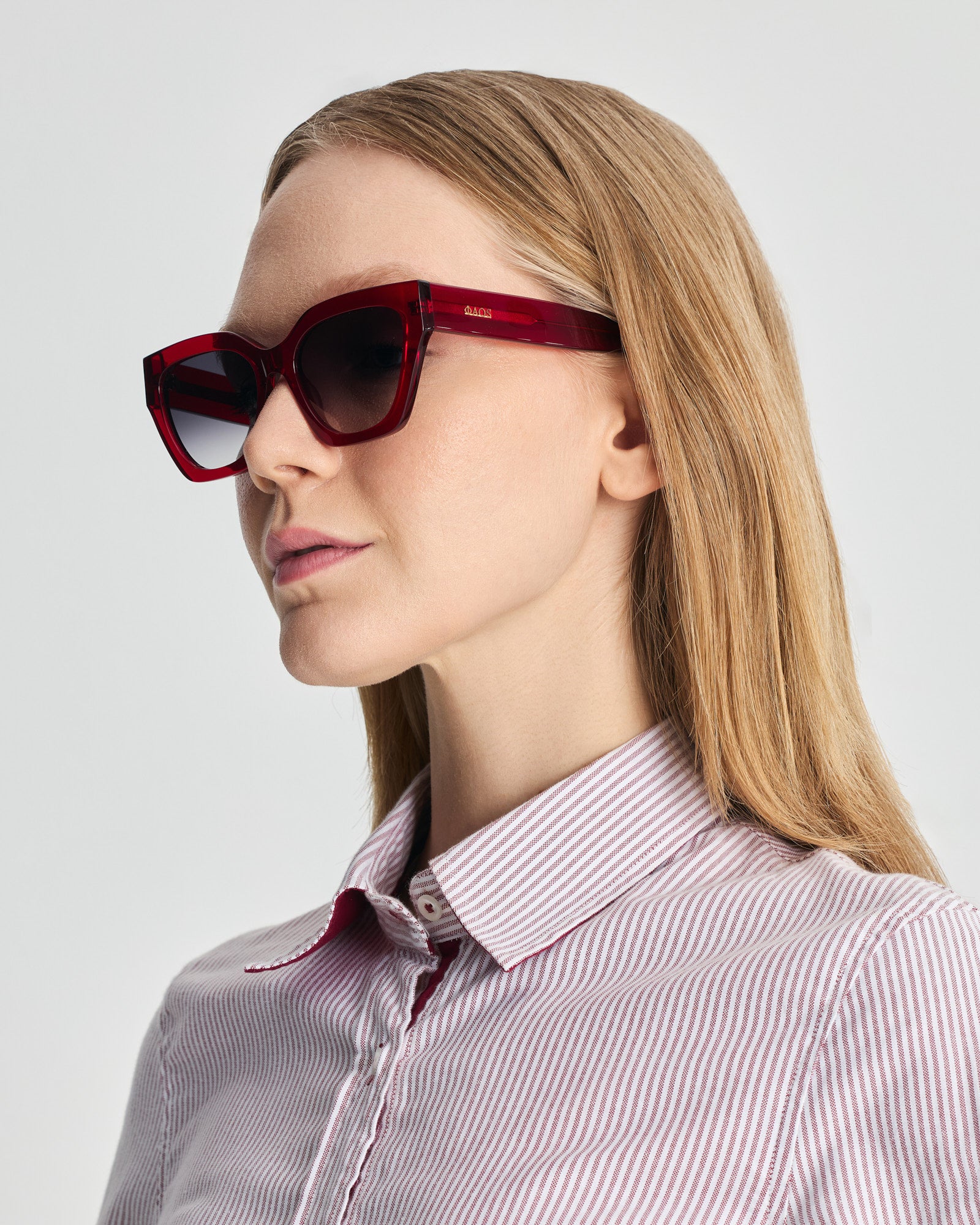 SKYROS IN CRYSTAL RED WITH SUNSET GREY LENSES