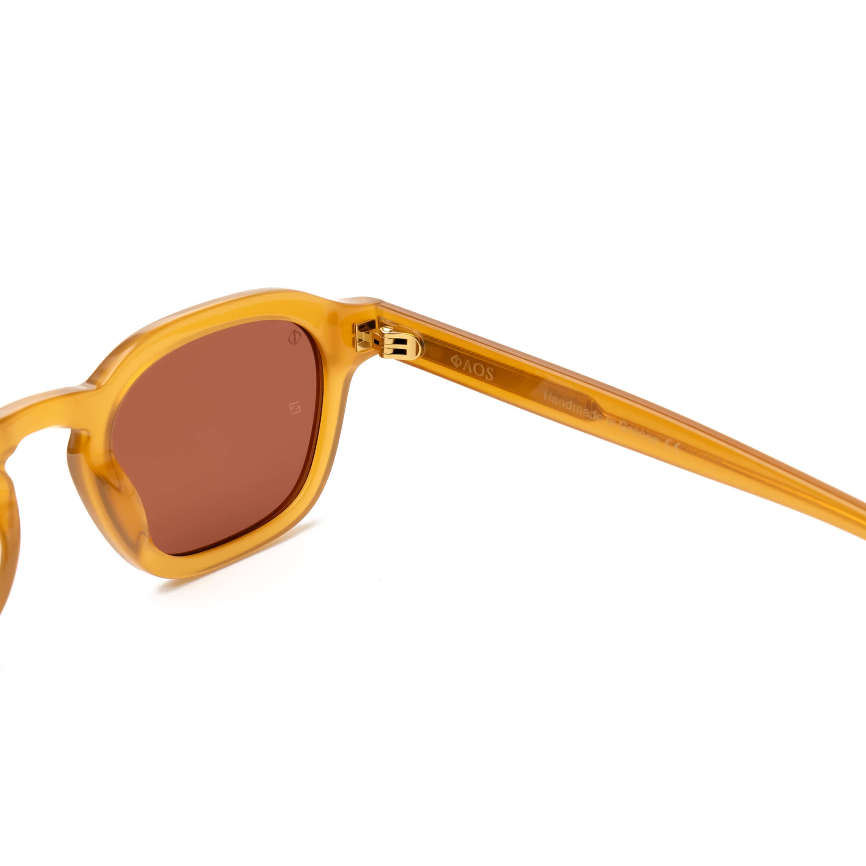 SIKINOS IN ELECTRUM AMBER WITH MAROON LENSES