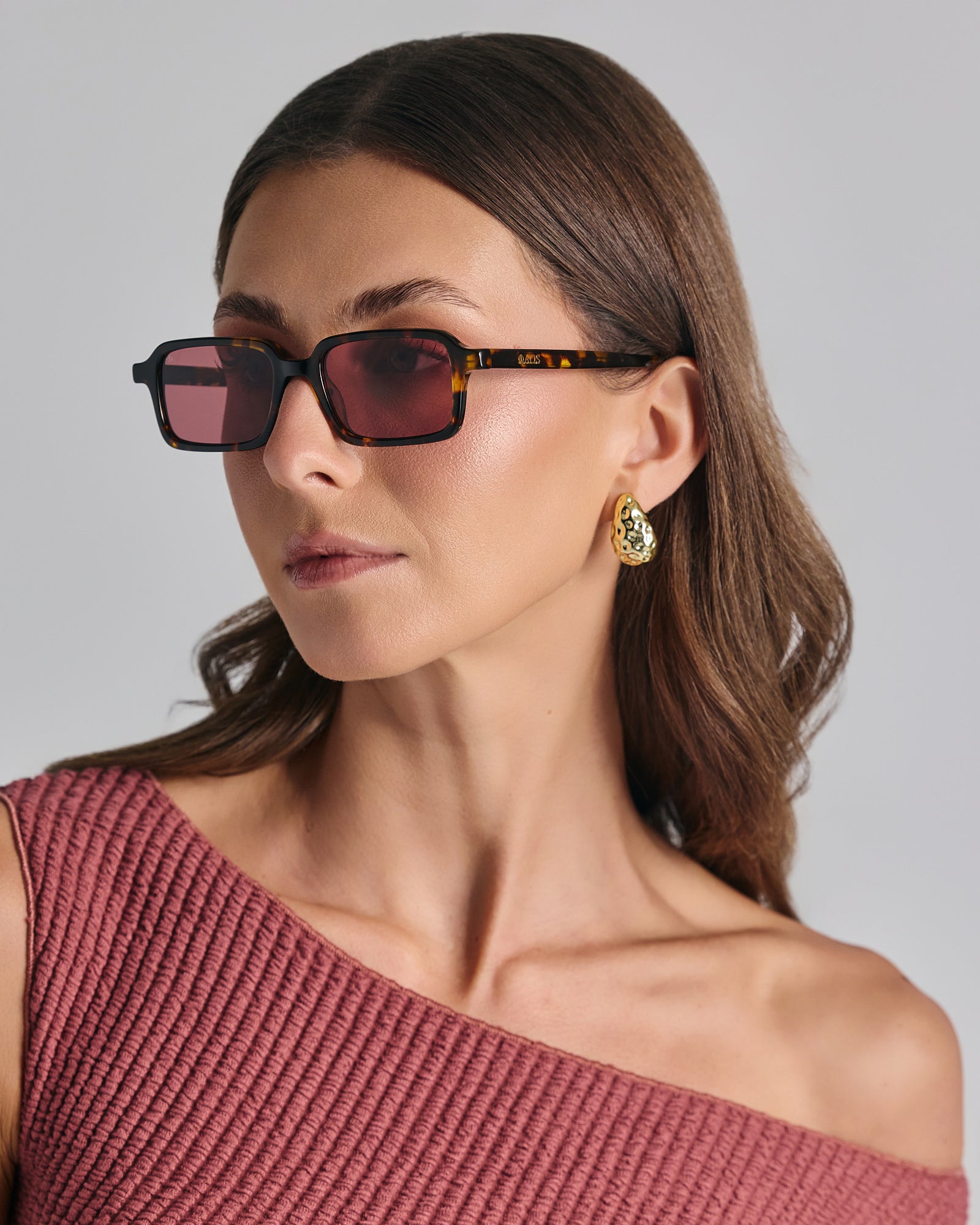 KEROS IN MARBLE BROWN WITH VOLCANIC RED LENSES